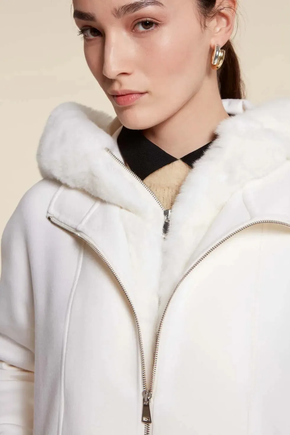 White parka with fur hood